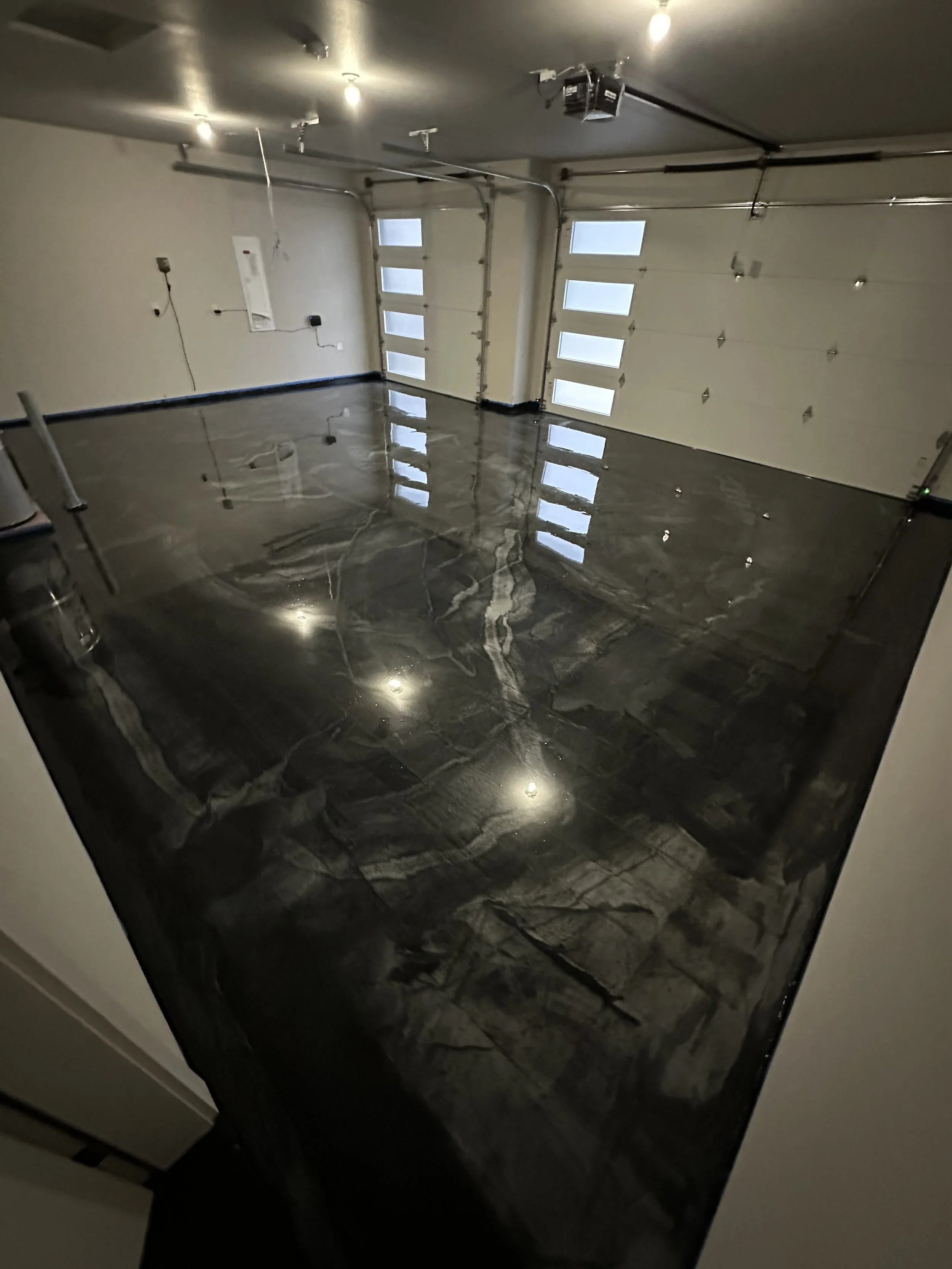 See a Metallic Epoxy Floor in Your Garage project by Abstract Floor Coatings
