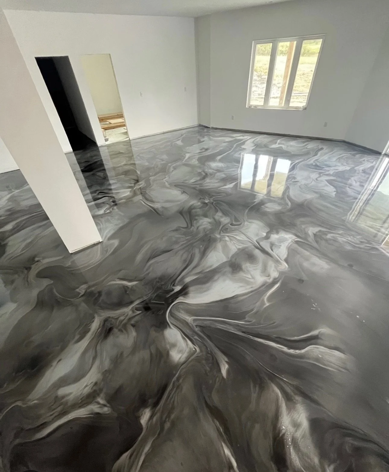 See a Metallic Epoxy Floor in Your Garage project by Abstract Floor Coatings